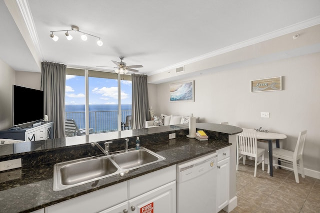 16819 Front Beach Rd Unit 2116, Panama City Beach, FL 32413 - kitchen with white dishwasher, a sink, open floor plan, ceiling fan, and white cabinetry