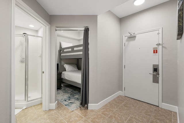 16819 Front Beach Rd Unit 2116, Panama City Beach, FL 32413 - hallway with baseboards and light tile patterned floors