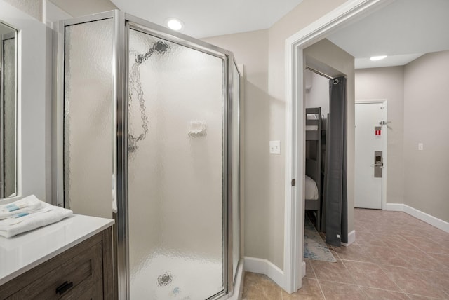 16819 Front Beach Rd Unit 2116, Panama City Beach, FL 32413 - bathroom featuring a shower stall, baseboards, tile patterned floors, and recessed lighting