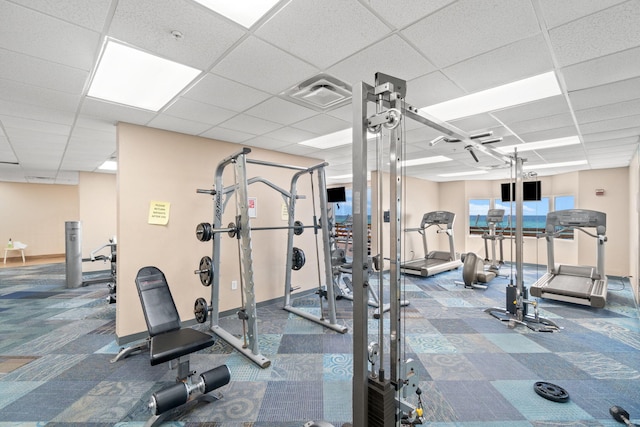 16819 Front Beach Rd Unit 2116, Panama City Beach, FL 32413 - exercise room with carpet, a drop ceiling, and baseboards