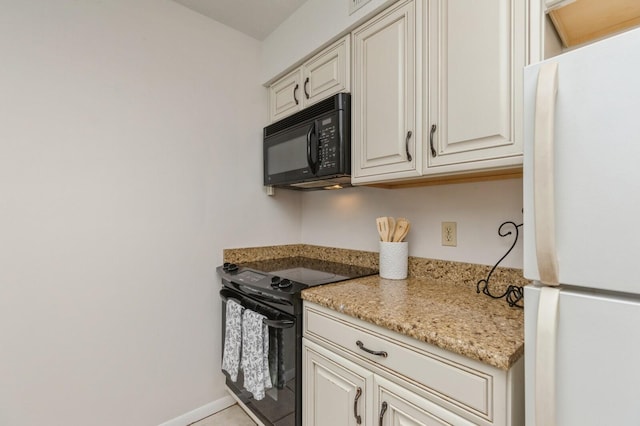 104 Country Club Dr Unit 104, Niceville, FL 32578 - kitchen featuring black appliances and light stone counters
