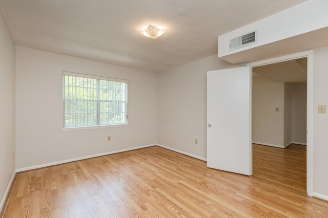 104 Country Club Dr Unit 104, Niceville, FL 32578 - unfurnished room featuring light wood finished floors and baseboards