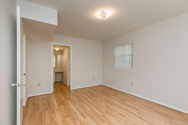 104 Country Club Dr Unit 104, Niceville, FL 32578 - unfurnished bedroom featuring light wood-style flooring and baseboards