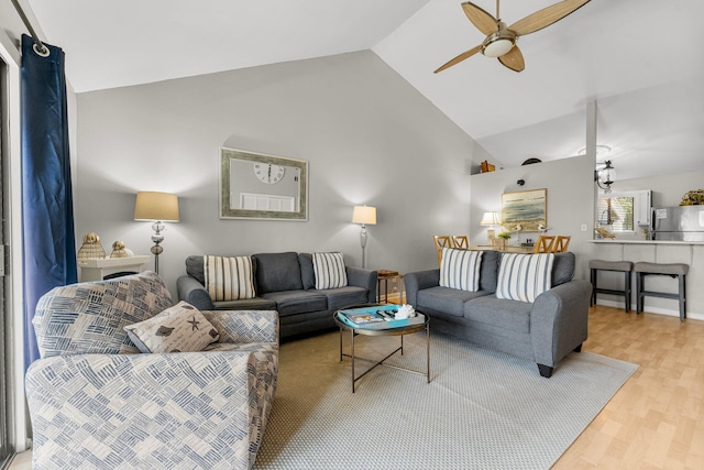 3755 Scenic Highway 98 Unit 1203, Destin, FL 32541 - living room with a ceiling fan, wood finished floors, and high vaulted ceiling