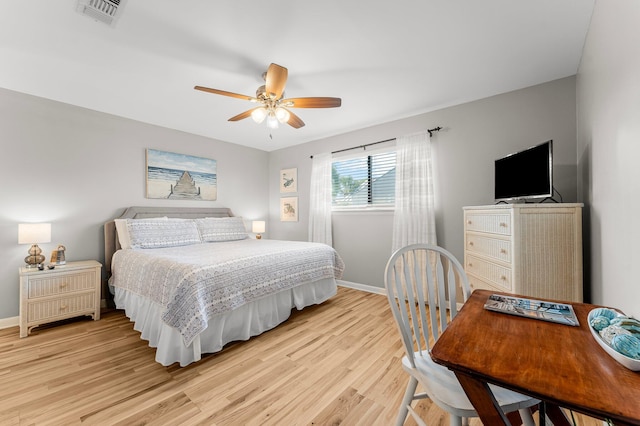 3755 Scenic Highway 98 Unit 1203, Destin, FL 32541 - bedroom featuring light wood-style floors, baseboards, and ceiling fan