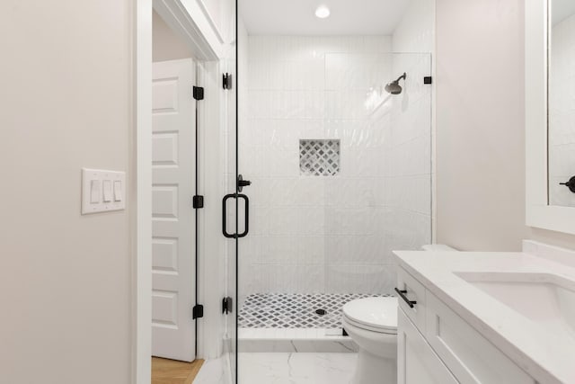 335 J Hunters Way S, Freeport, FL 32439 - bathroom featuring vanity, a stall shower, toilet, and recessed lighting
