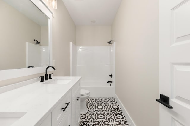 335 J Hunters Way S, Freeport, FL 32439 - full bath featuring double vanity, toilet, tile patterned flooring, baseboards, and  shower combination