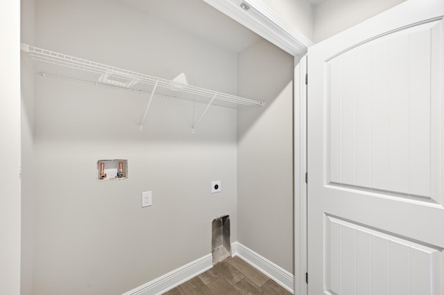 74 Tranquility Ln, Santa Rosa Beach, FL 32459 - laundry area featuring hookup for an electric dryer, dark wood-type flooring, and hookup for a washing machine