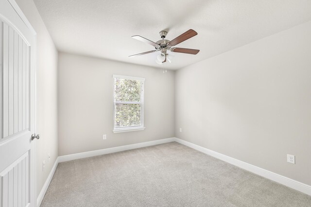 74 Tranquility Ln, Santa Rosa Beach, FL 32459 - empty room with ceiling fan and light colored carpet