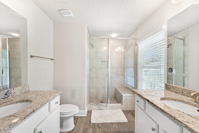 74 Tranquility Ln, Santa Rosa Beach, FL 32459 - full bathroom featuring two vanities and a stall shower