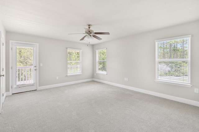 74 Tranquility Ln, Santa Rosa Beach, FL 32459 - empty room with light colored carpet and a ceiling fan