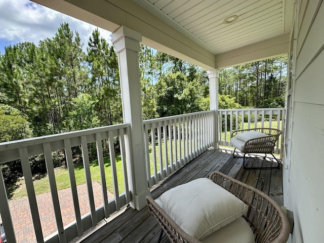 74 Tranquility Ln, Santa Rosa Beach, FL 32459 - deck featuring view of wooded area