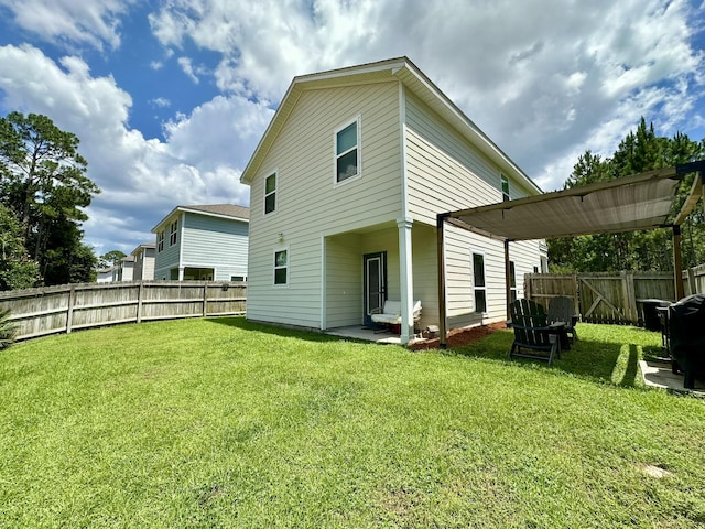 74 Tranquility Ln, Santa Rosa Beach, FL 32459 - rear view of property featuring a fenced backyard and a patio