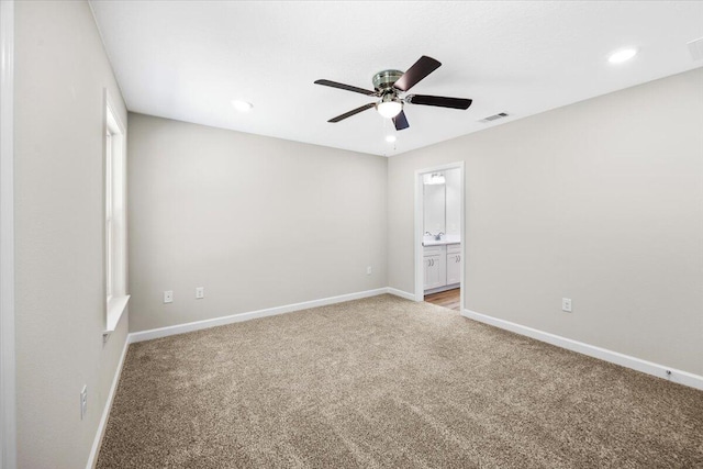 3158 Chestnut St, Crestview, FL 32539 - empty room featuring light colored carpet, a ceiling fan, baseboards, and recessed lighting