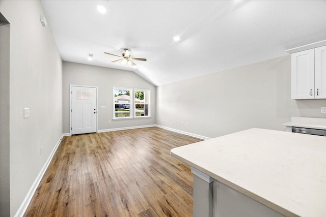3158 Chestnut St, Crestview, FL 32539 - unfurnished living room featuring a ceiling fan, lofted ceiling, light wood-type flooring, baseboards, and recessed lighting