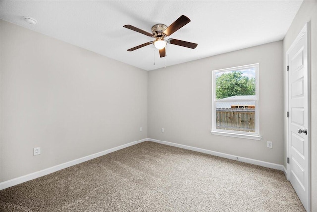 3158 Chestnut St, Crestview, FL 32539 - empty room with carpet floors, ceiling fan, baseboards, and a smoke detector