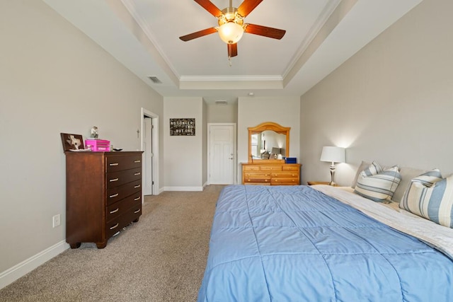 809 Whispering Creek Ave, Freeport, FL 32439 - bedroom with a tray ceiling, light colored carpet, ornamental molding, baseboards, and a ceiling fan