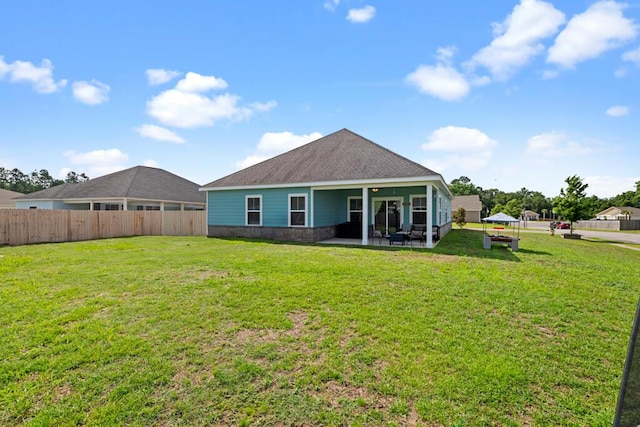 809 Whispering Creek Ave, Freeport, FL 32439 - rear view of house with a patio
