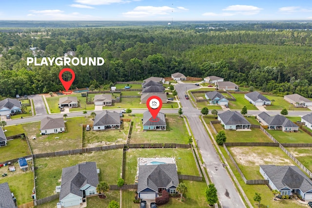 809 Whispering Creek Ave, Freeport, FL 32439 - aerial view of residential area featuring a heavily wooded area