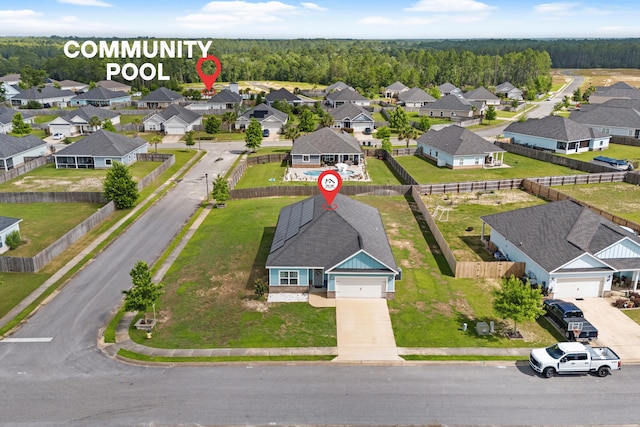 809 Whispering Creek Ave, Freeport, FL 32439 - aerial view of residential area with a forest