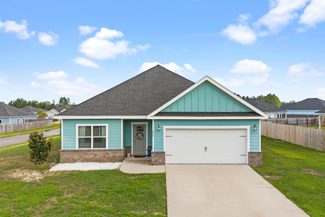 809 Whispering Creek Ave, Freeport, FL 32439 - view of front of home featuring brick siding, concrete driveway, a garage, board and batten siding, and a shingled roof