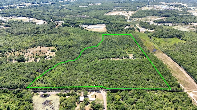 841 N 1st St, Defuniak Springs, FL 32433 - view of property location with a forest and property boundaries highlighted