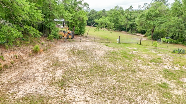 841 N 1st St, Defuniak Springs, FL 32433 - view of yard featuring a rural view and a view of trees
