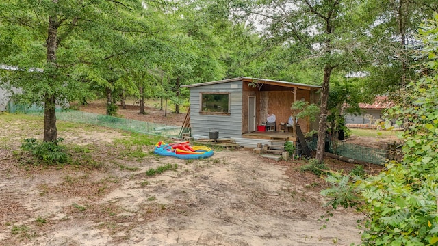 841 N 1st St, Defuniak Springs, FL 32433 - view of yard featuring an outdoor structure