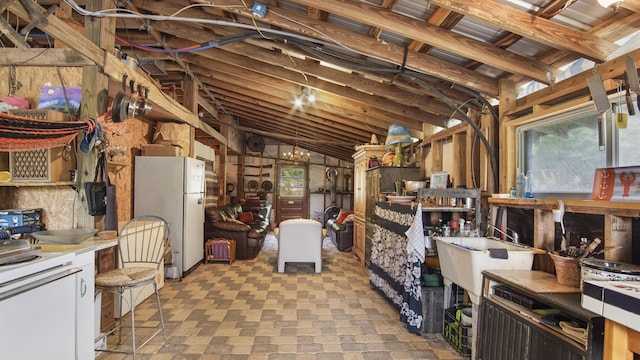 841 N 1st St, Defuniak Springs, FL 32433 - basement with freestanding refrigerator