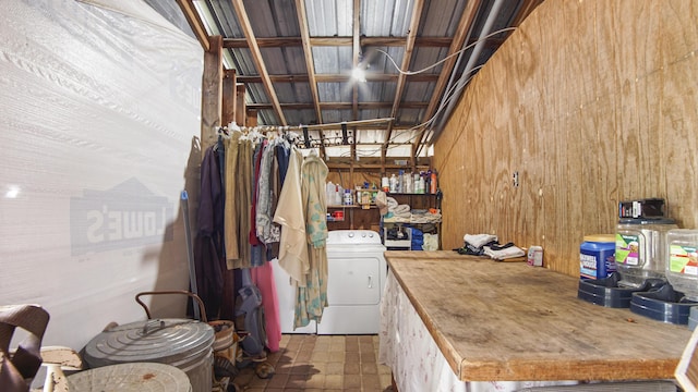 841 N 1st St, Defuniak Springs, FL 32433 - basement featuring washer / dryer and wooden walls