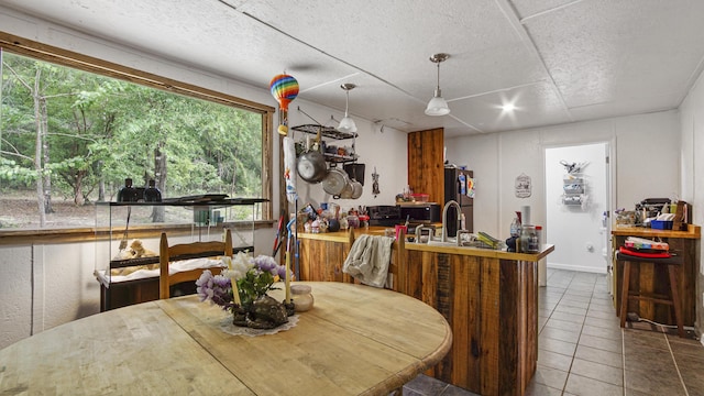 841 N 1st St, Defuniak Springs, FL 32433 - dining space featuring tile patterned floors