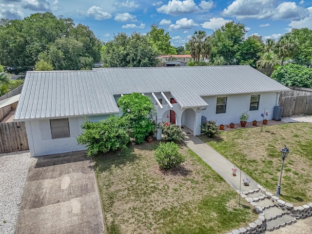 3892 Belmar Pl, Chipley, FL 32428 - view of front facade with stucco siding and metal roof