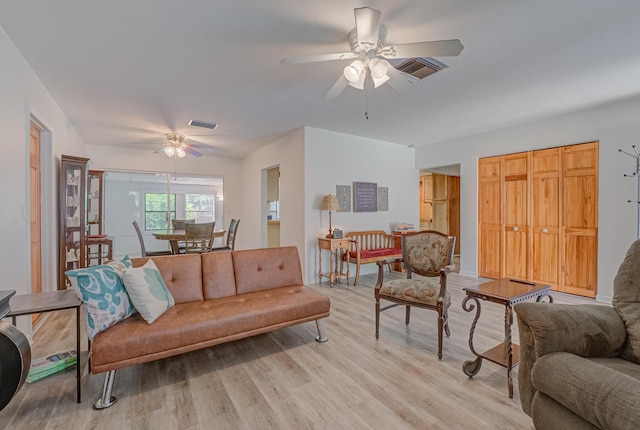 3892 Belmar Pl, Chipley, FL 32428 - living area with ceiling fan and light wood-style flooring