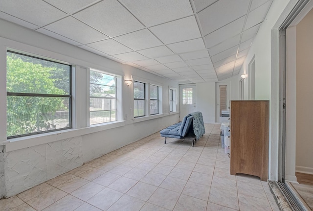 3892 Belmar Pl, Chipley, FL 32428 - unfurnished sunroom featuring tile patterned floors and a drop ceiling