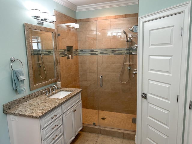 1976 Baytowne Loop, Miramar Beach, FL 32550 - bathroom with crown molding, a shower stall, vanity, and tile patterned floors