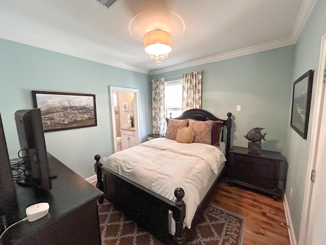 1976 Baytowne Loop, Miramar Beach, FL 32550 - bedroom with crown molding, wood finished floors, and ensuite bathroom