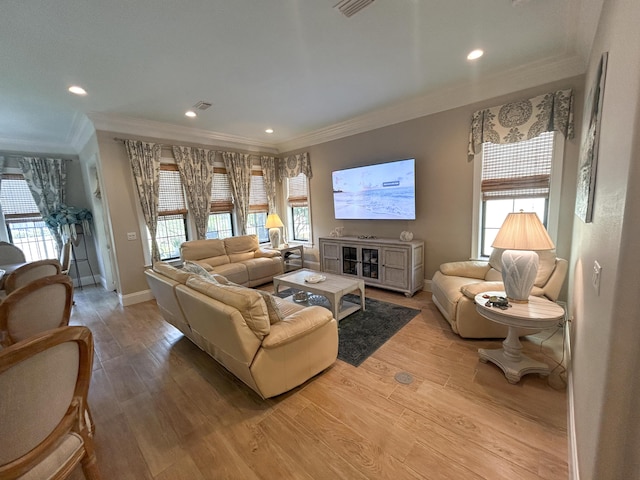 1976 Baytowne Loop, Miramar Beach, FL 32550 - living room with ornamental molding, healthy amount of natural light, light wood-type flooring, and recessed lighting