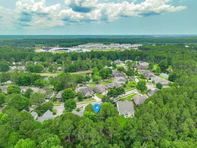53 Concert Ct, Freeport, FL 32439 - aerial view of residential area with a forest
