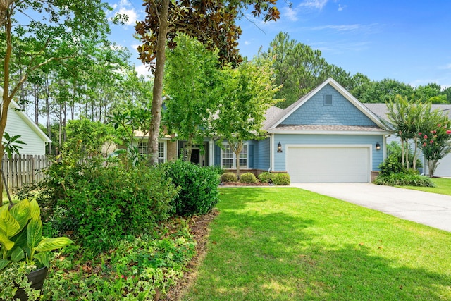 53 Concert Ct, Freeport, FL 32439 - view of front of house featuring an attached garage, concrete driveway, and roof with shingles