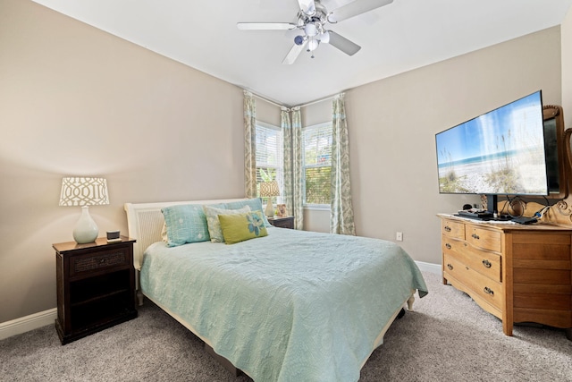 53 Concert Ct, Freeport, FL 32439 - bedroom with light colored carpet, baseboards, and a ceiling fan