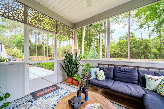 53 Concert Ct, Freeport, FL 32439 - sunroom featuring an outdoor living space and ceiling fan
