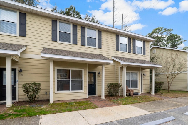 15284 331 Business Unit 11B, Freeport, FL 32439 - view of property with roof with shingles