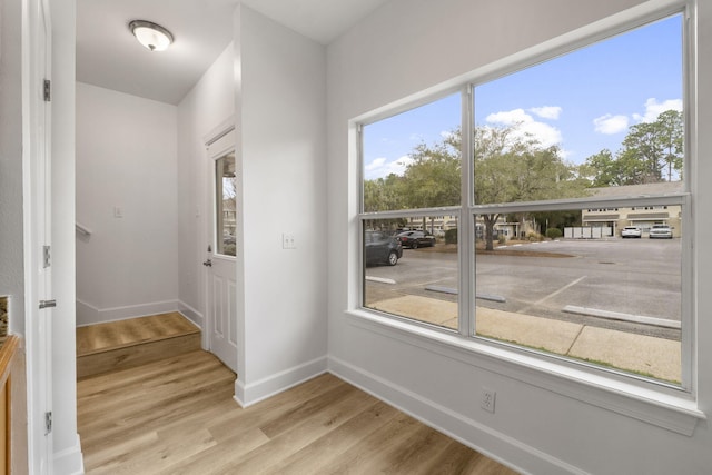 15284 331 Business Unit 11B, Freeport, FL 32439 - foyer entrance featuring wood finished floors and baseboards