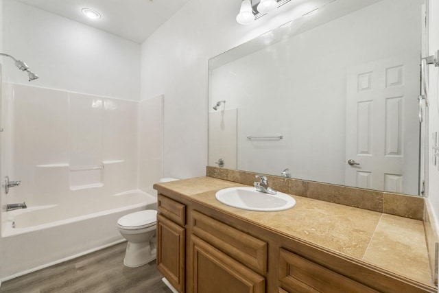 15284 331 Business Unit 11B, Freeport, FL 32439 - full bathroom with toilet, vanity, shower / washtub combination, and wood finished floors