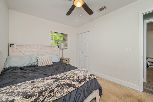 544 Purl Adams Ave, Crestview, FL 32539 - carpeted bedroom featuring baseboards, a closet, and a ceiling fan