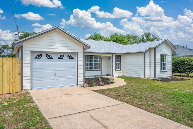 2129 Hillary Ln, Navarre, FL 32566 - ranch-style home featuring concrete driveway, roof with shingles, and a garage