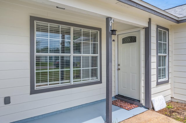 2129 Hillary Ln, Navarre, FL 32566 - doorway to property with covered porch
