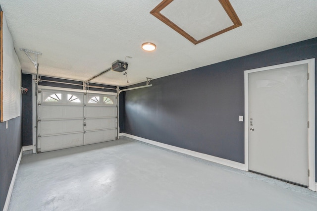 2129 Hillary Ln, Navarre, FL 32566 - garage with a garage door opener and baseboards