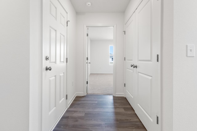 6004 Hidden Knoll Ct, Crestview, FL 32539 - hallway with dark wood-type flooring and baseboards