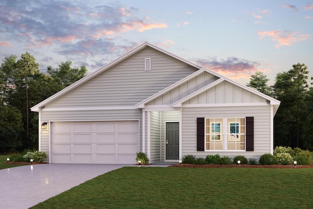 6004 Hidden Knoll Ct, Crestview, FL 32539 - view of front facade with board and batten siding, driveway, a front yard, and an attached garage